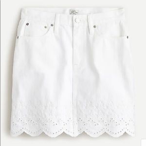 Denim mini skirt with eyelet hem